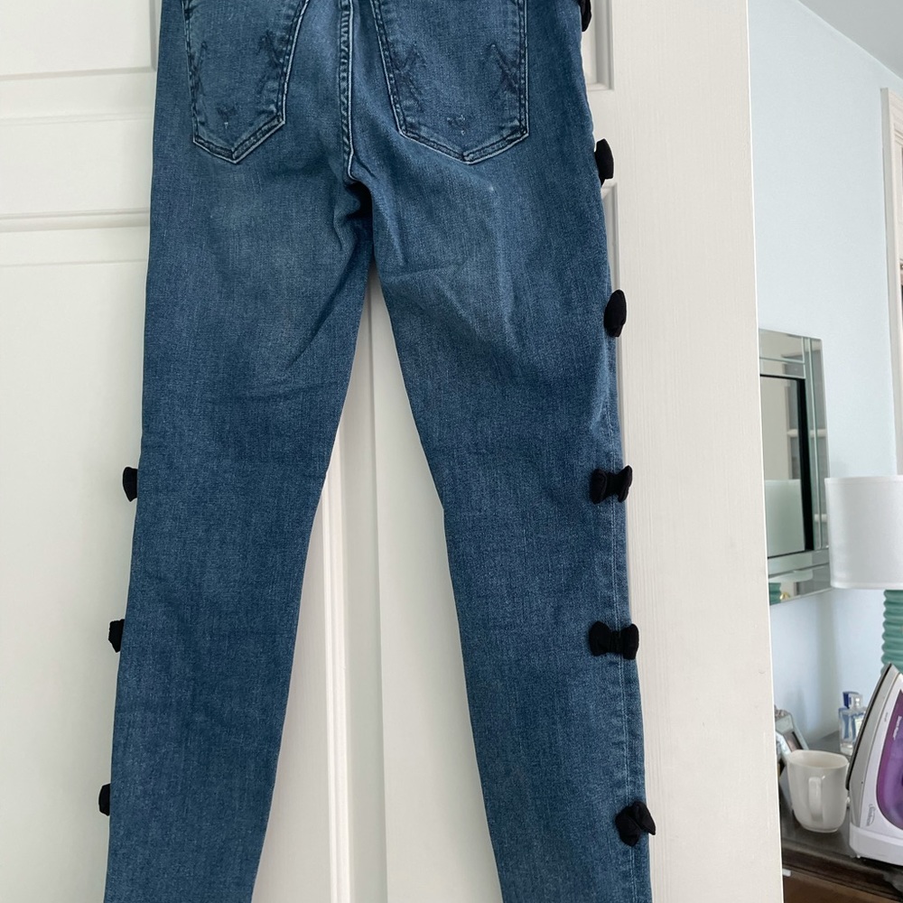 Maguire jeans with blk bows down legs